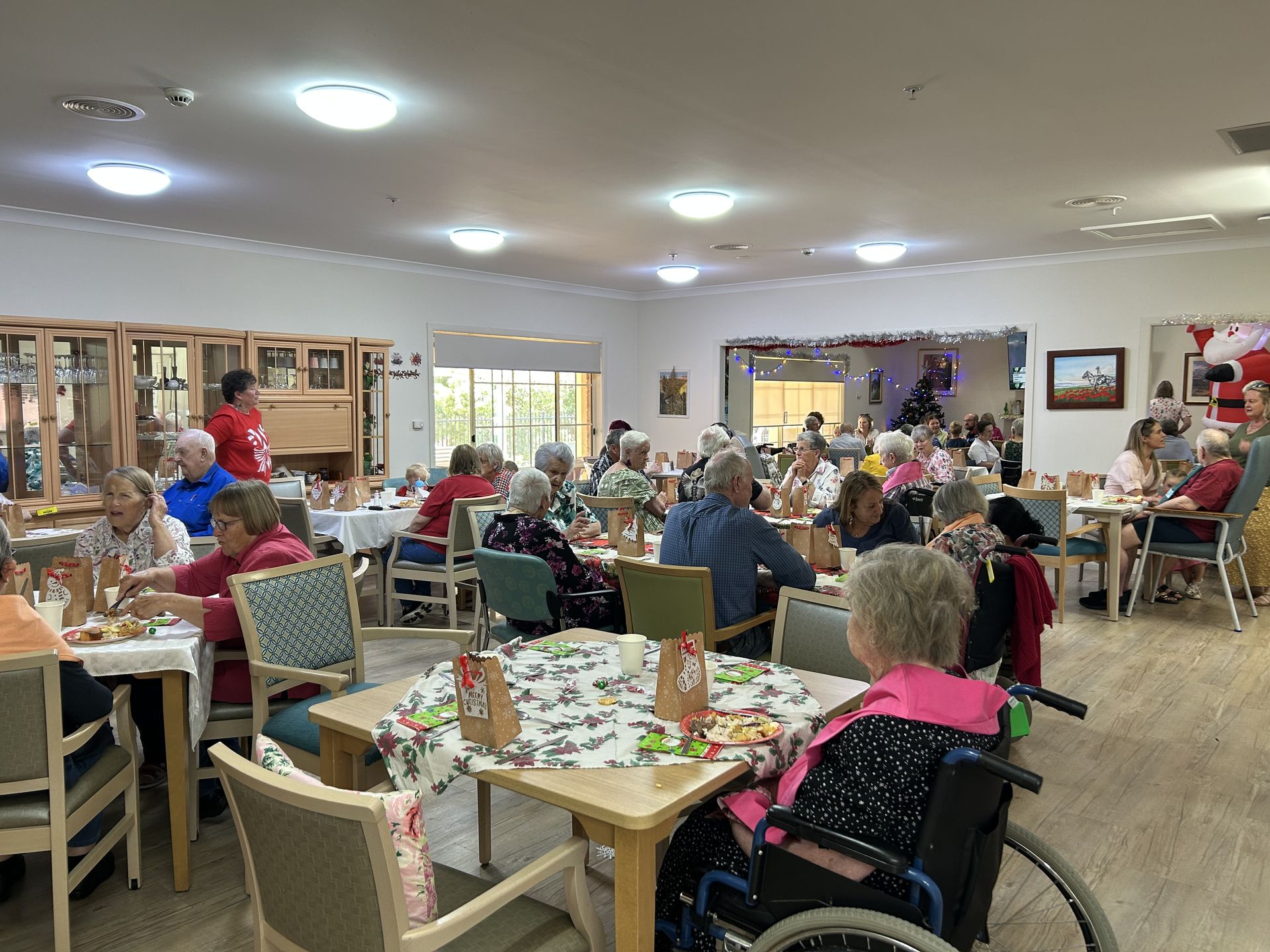 Residents and staff gathering in the Burrowa House dining room